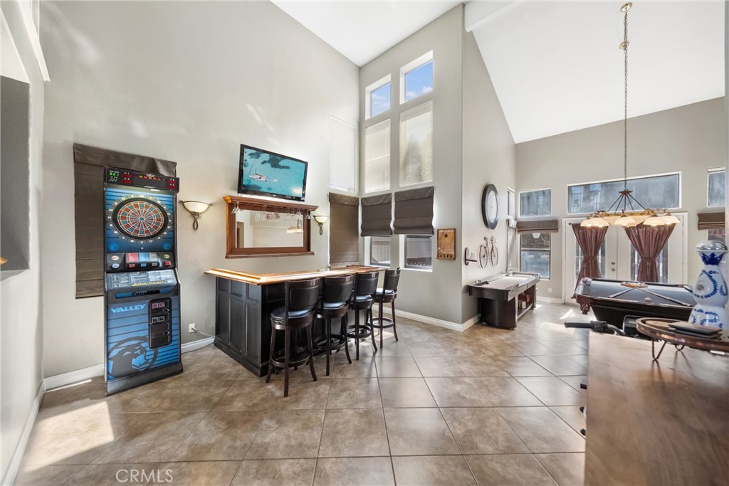 3270 Star Canyon Circle Corona, CA 92882 - Photo 5 of 55 a living room with furniture a dining table and chairs