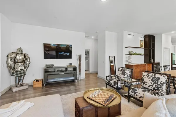 a kitchen with a table and chairs in it