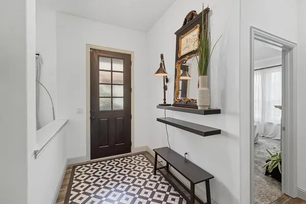 a room with window and wooden floor