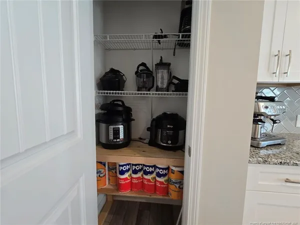 a view of storage and utility room