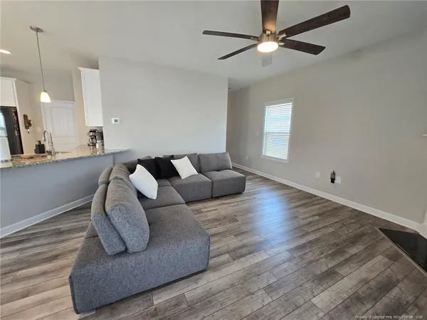 a living room with couches and furniture