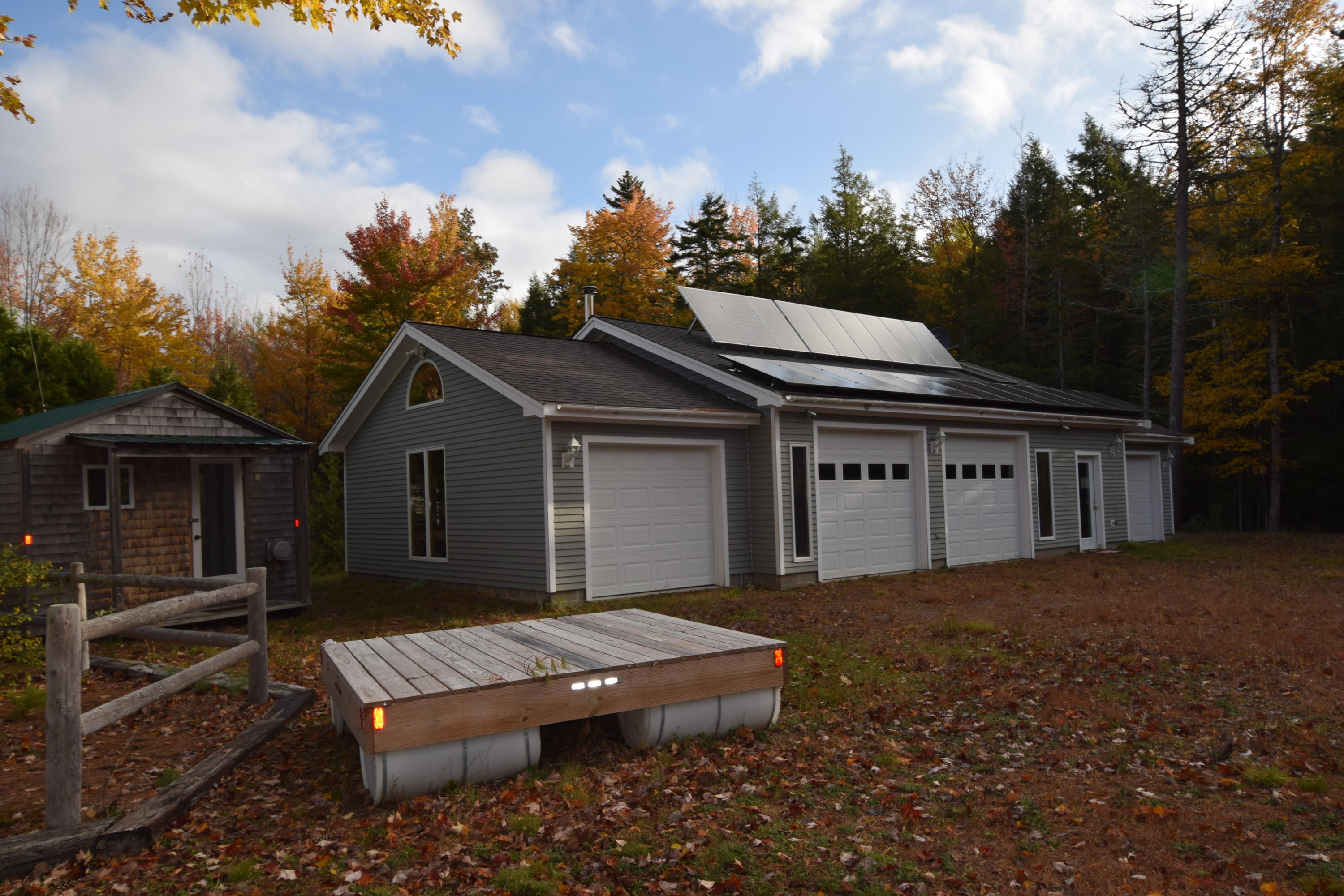 6 Sunset Cove Road Princeton, ME 04668 - Photo 5 of 35 Four bay garage with solar panels...