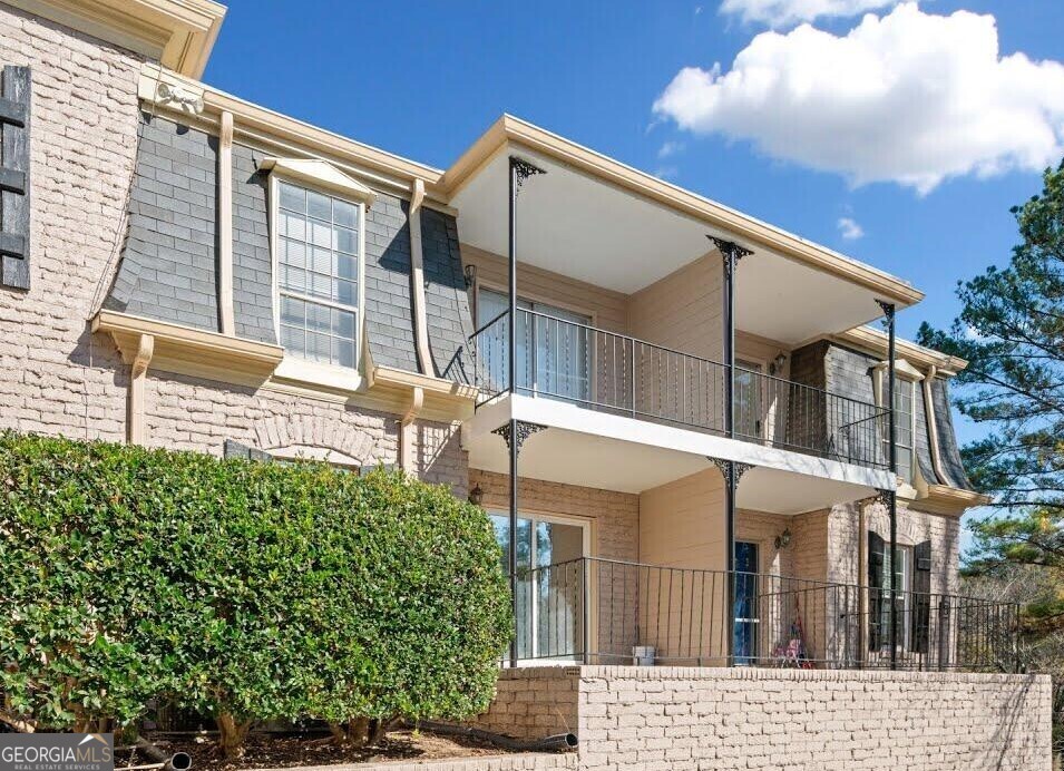 a view of a house with a balcony