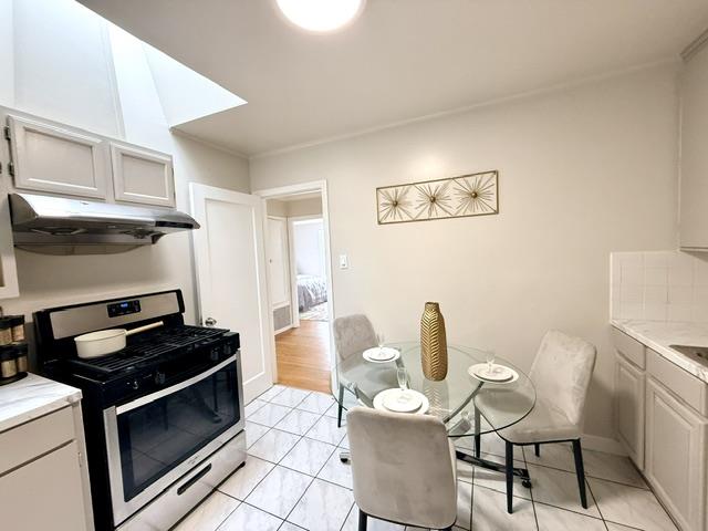 135 Bepler Street Daly City, CA 94014 - Photo 11 of 34 a kitchen with a table and chairs