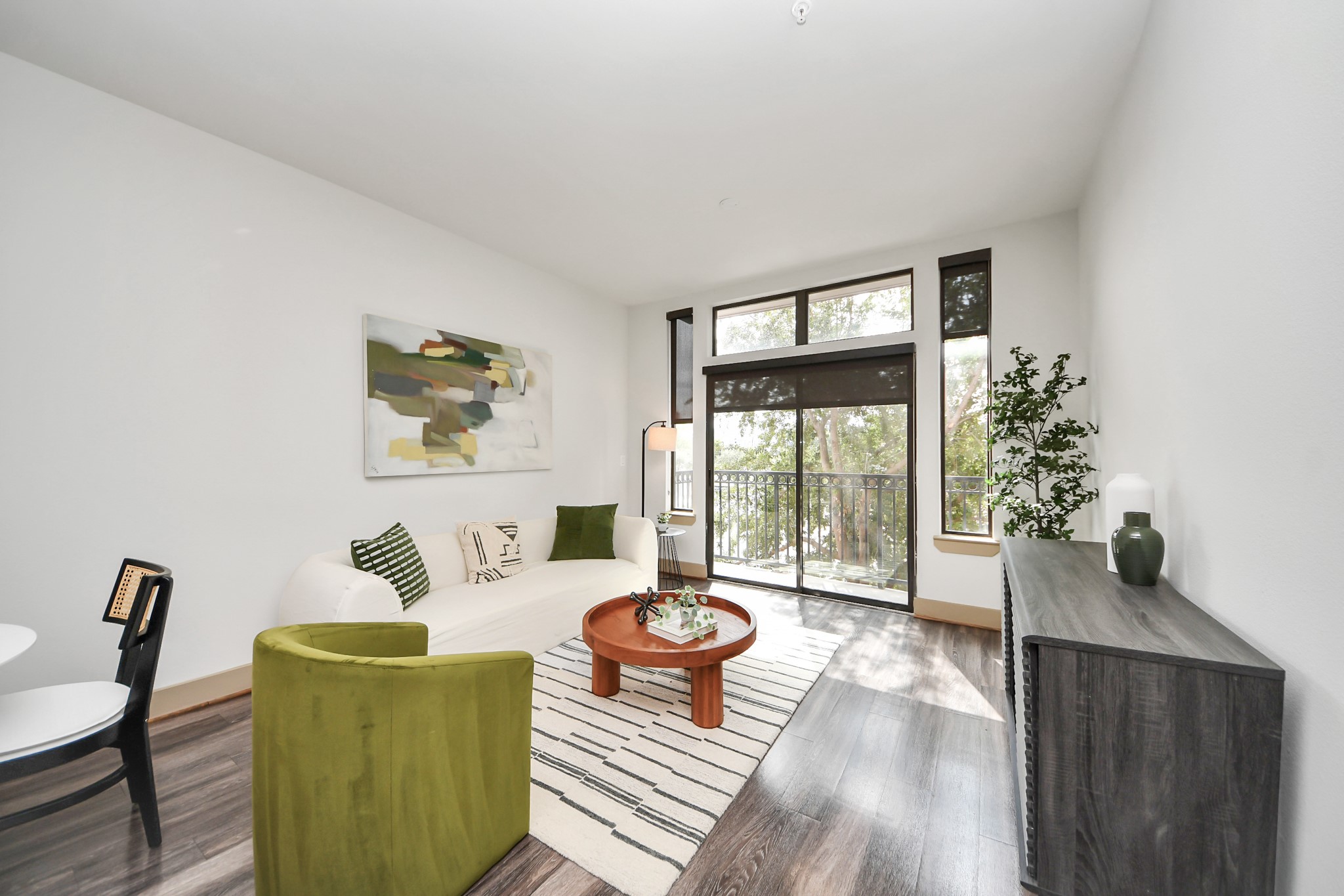 3800 Main Street, Unit 1 226 Houston, TX 77002 - Photo 30 of 50 a living room with furniture and a large window