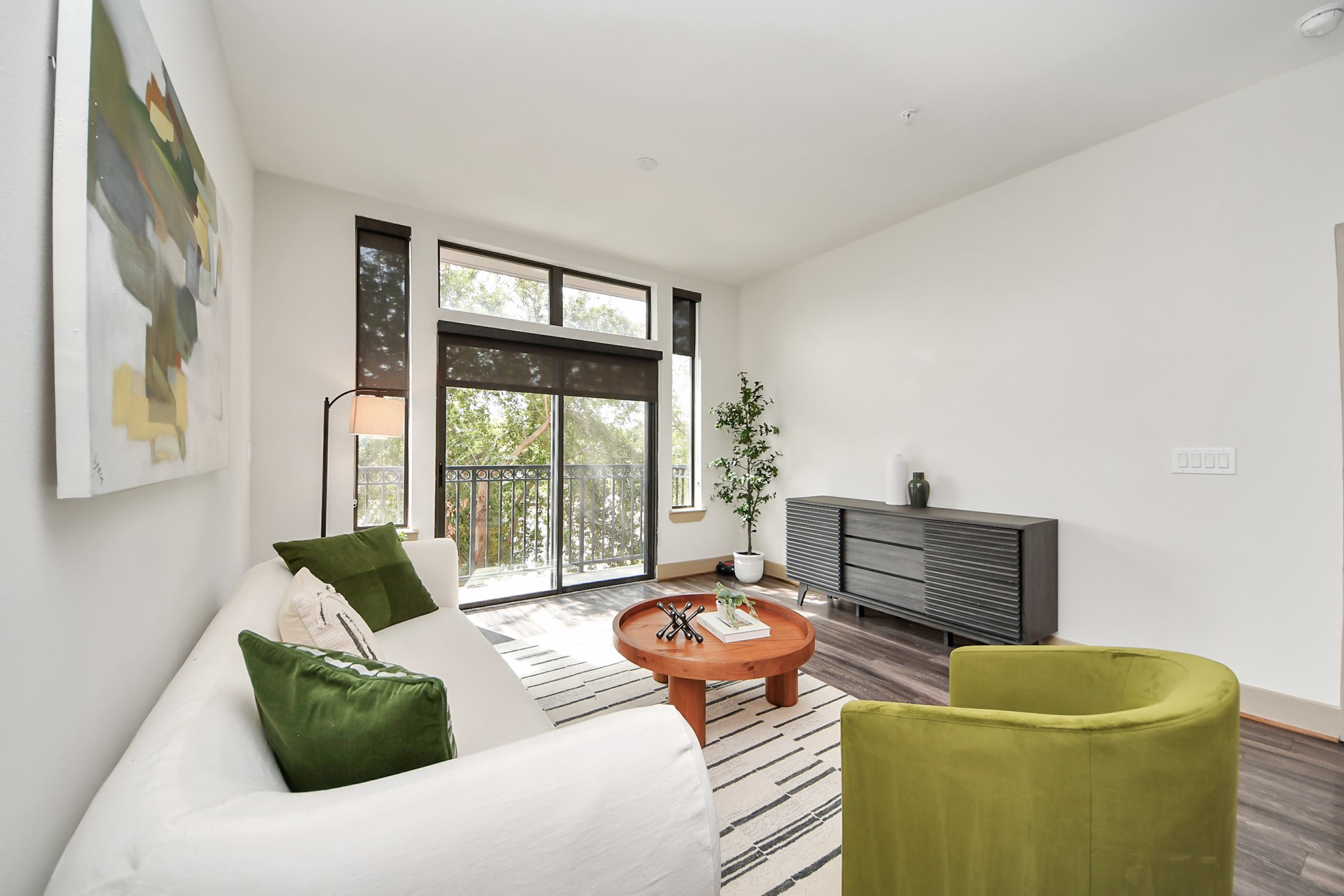 3800 Main Street, Unit 1 226 Houston, TX 77002 - Photo 31 of 50 a living room with furniture and a floor to ceiling window