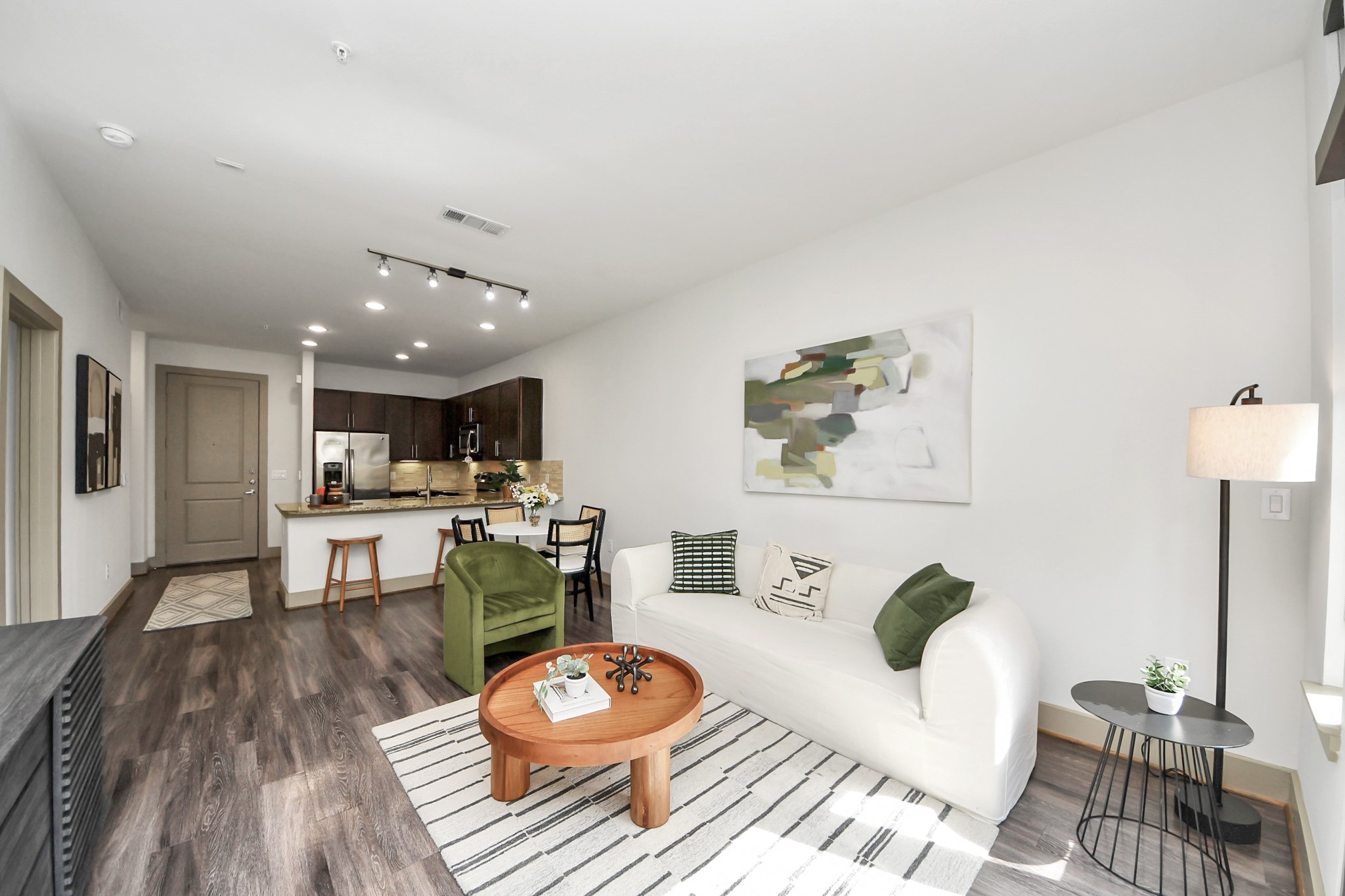 3800 Main Street, Unit 1 226 Houston, TX 77002 - Photo 33 of 50 a living room with furniture and a wooden floor