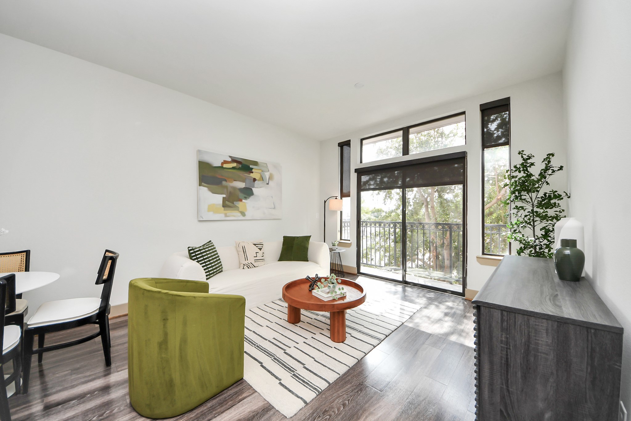 3800 Main Street, Unit 1 226 Houston, TX 77002 - Photo 35 of 50 a living room with furniture and a large window