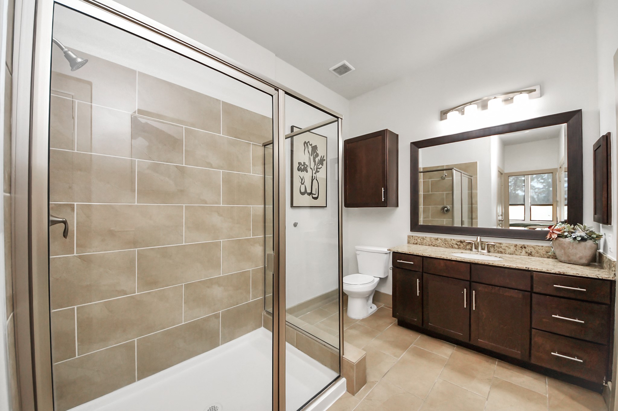 3800 Main Street, Unit 1 226 Houston, TX 77002 - Photo 43 of 50 a bathroom with a double vanity sink toilet mirror and bathtub