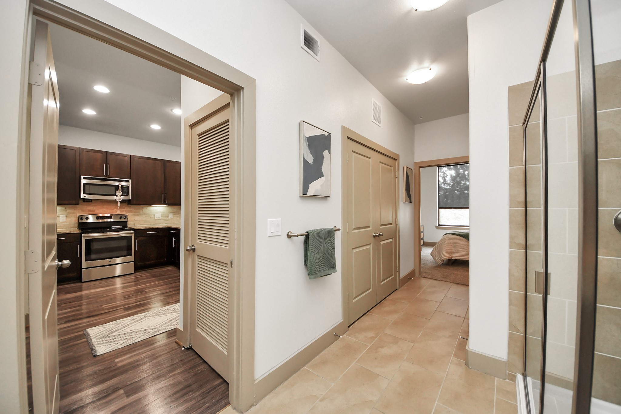 3800 Main Street, Unit 1 226 Houston, TX 77002 - Photo 46 of 50 a view of a kitchen with a refrigerator and a stove top oven