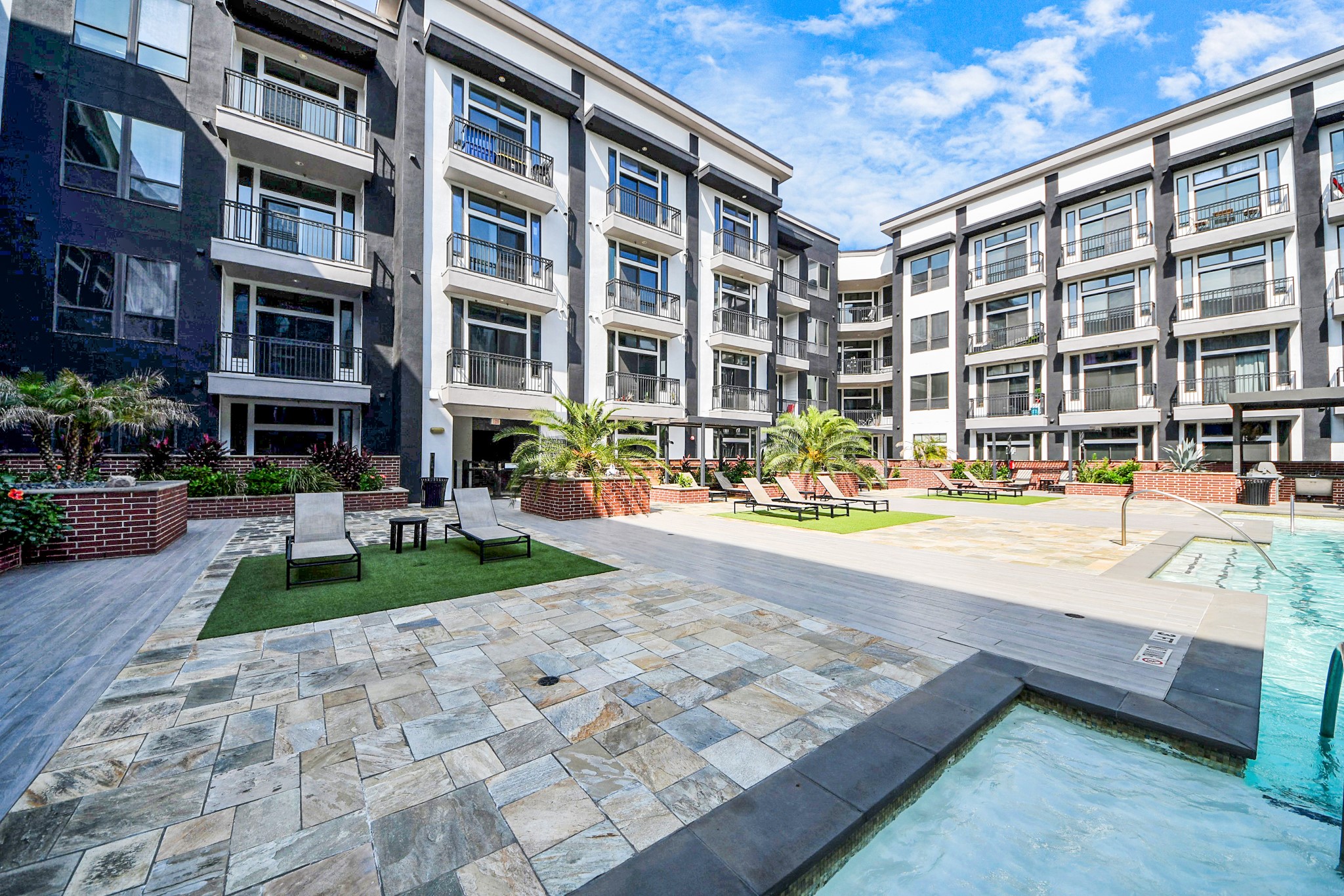3800 Main Street, Unit 1 226 Houston, TX 77002 - Photo 7 of 50 a front view of building with yard