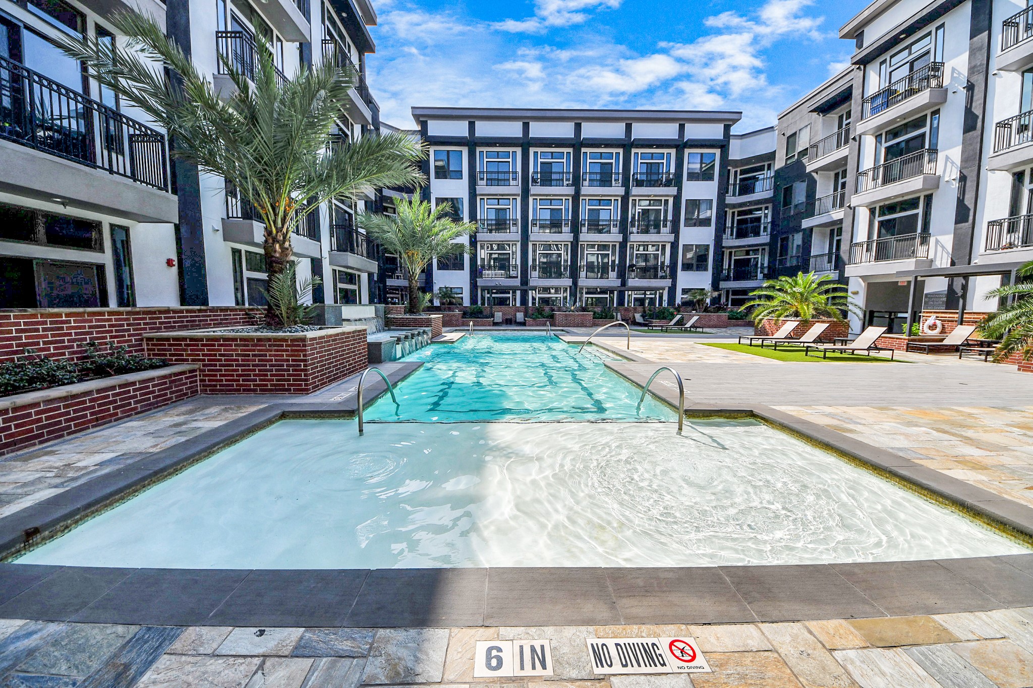 3800 Main Street, Unit 1 226 Houston, TX 77002 - Photo 10 of 50 a view of a building with potted plants