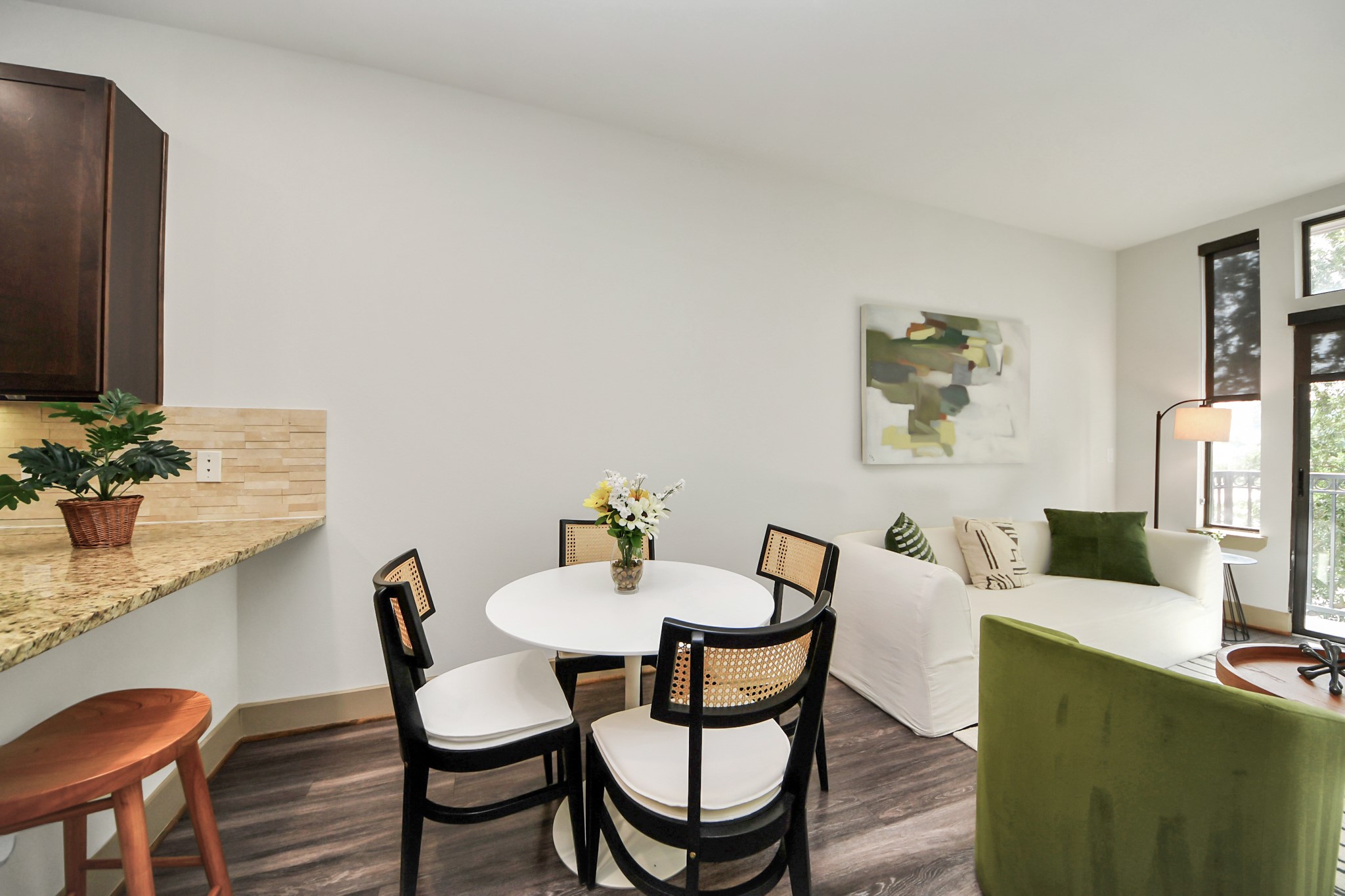 3800 Main Street, Unit 1 226 Houston, TX 77002 - Photo 29 of 50 a view of a dining room with furniture and a potted plant