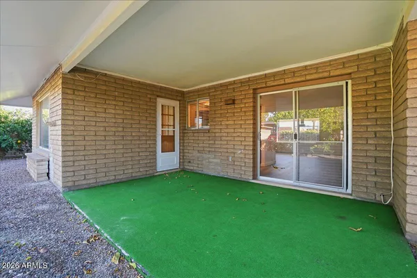 a view of a backyard with garden