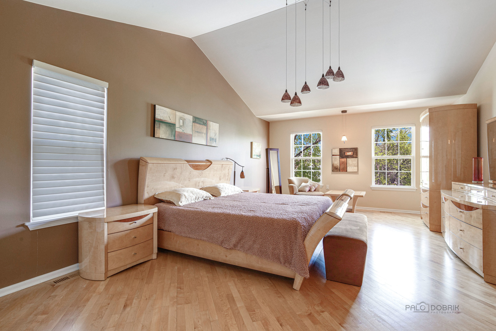 Undisclosed Address Long Grove, IL 60060 - Photo 19 of 35 a spacious bedroom with a bed and wooden floor