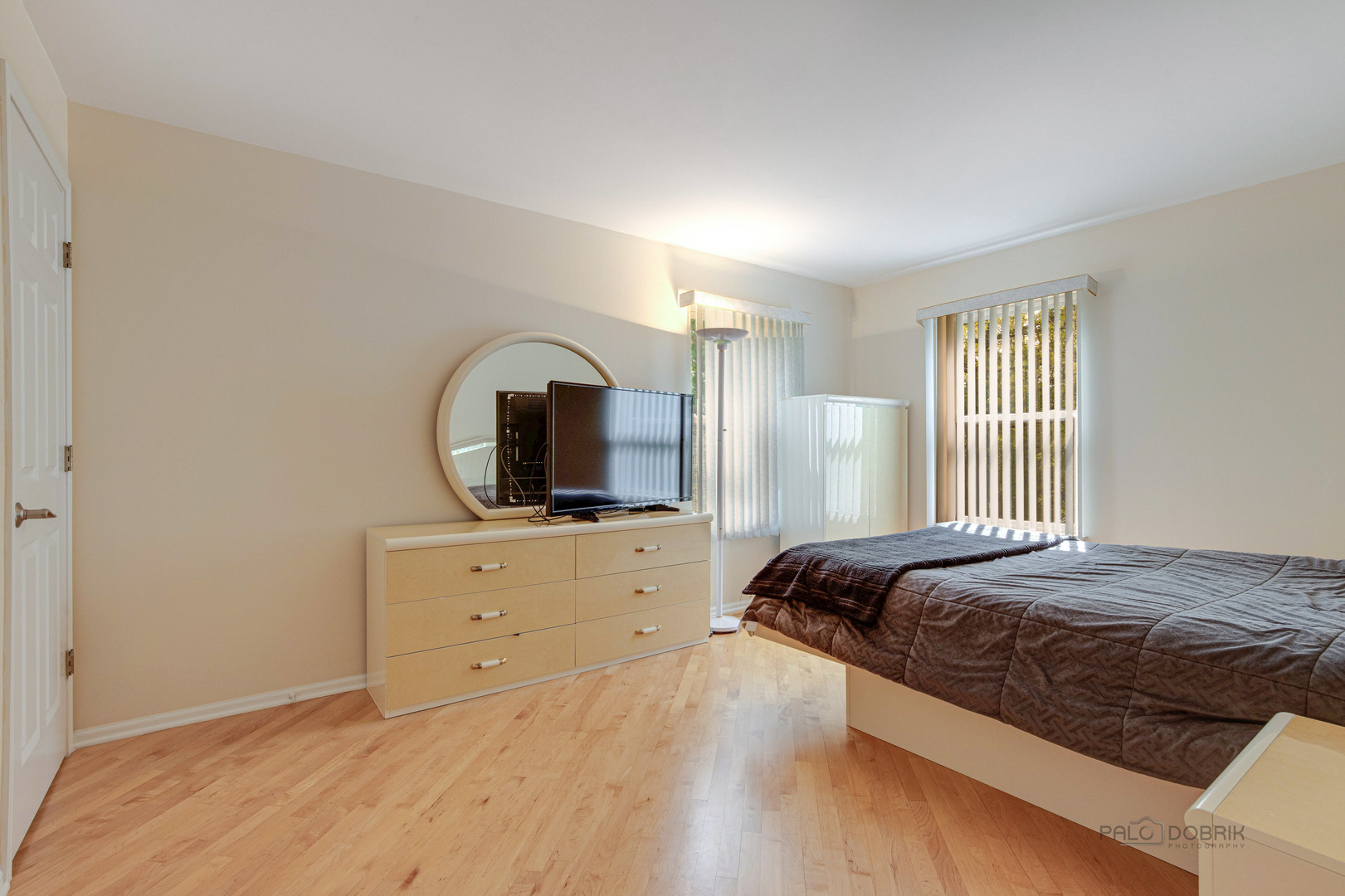 Undisclosed Address Long Grove, IL 60060 - Photo 24 of 35 a bedroom with a bed a window and dresser