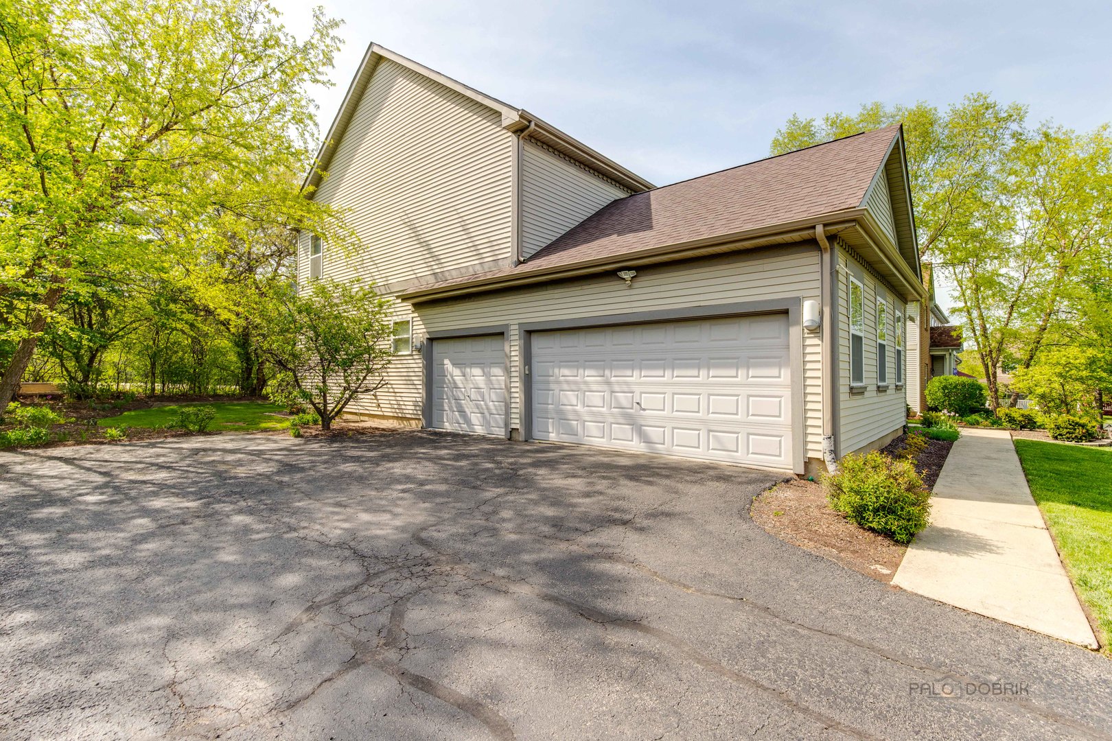 Undisclosed Address Long Grove, IL 60060 - Photo 35 of 35 a view of a house with a yard and potted plants