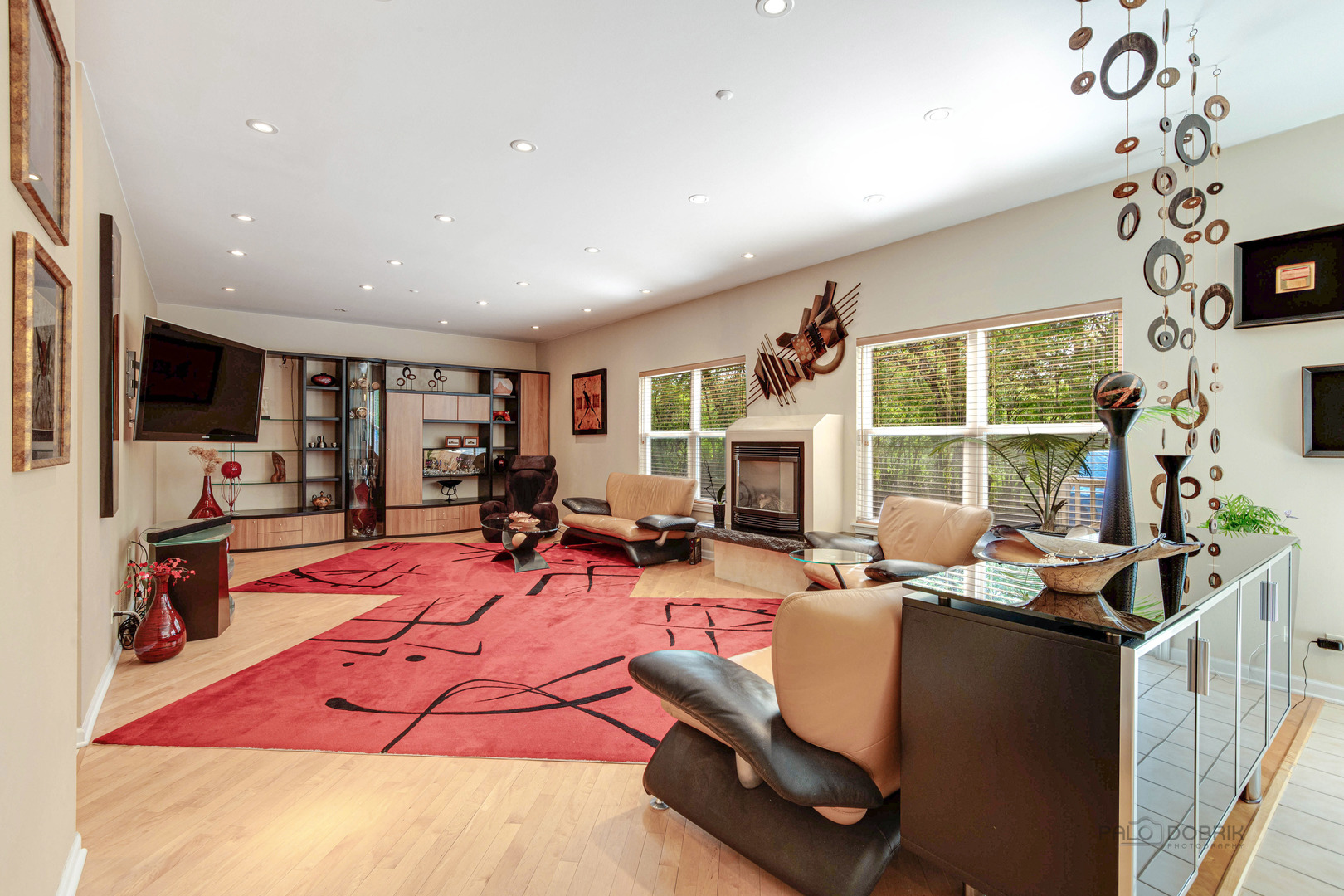 Undisclosed Address Long Grove, IL 60060 - Photo 7 of 35 a living room with furniture flat screen tv and a fireplace