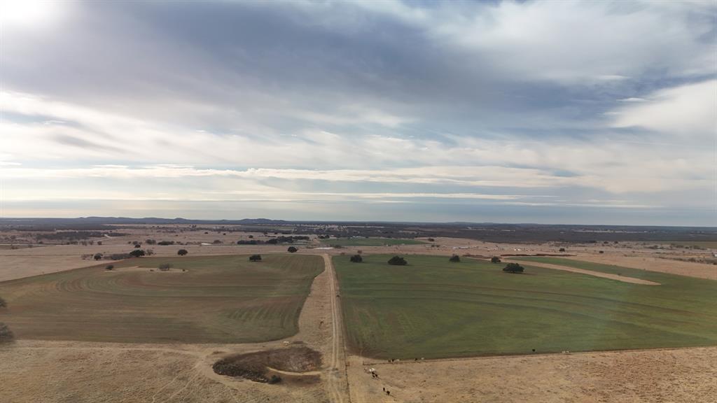 0 Stephens Lane Newcastle, TX 76372 - Photo 23 of 28 Grass waterway and a smaller pond with the mud cleaned out.