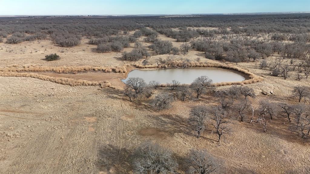 0 Stephens Lane Newcastle, TX 76372 - Photo 7 of 28 Pond with protective grass cover on the edge to reduce erosion