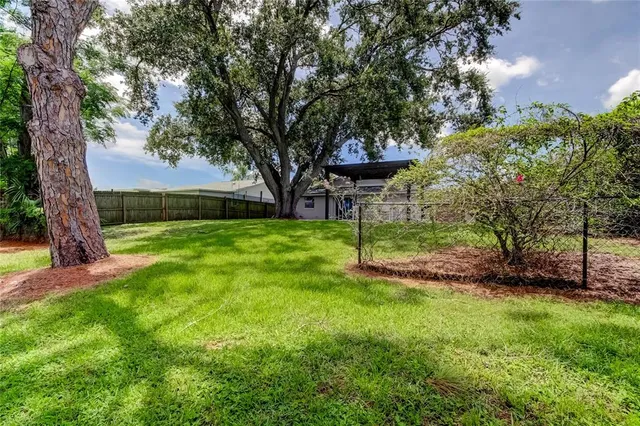 a view of a backyard with a garden