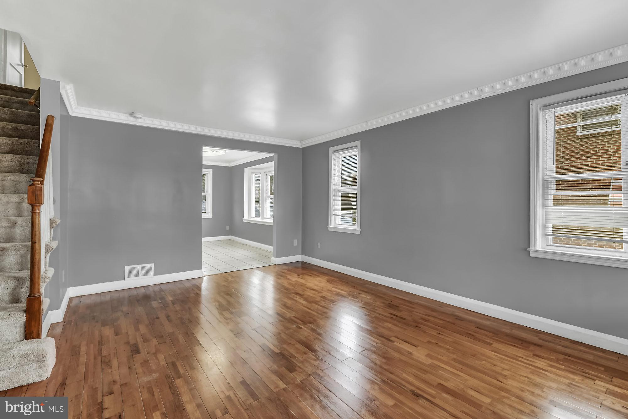 7921 Kavanagh Road Baltimore, MD 21222 - Photo 5 of 28 Living room looking into dining room