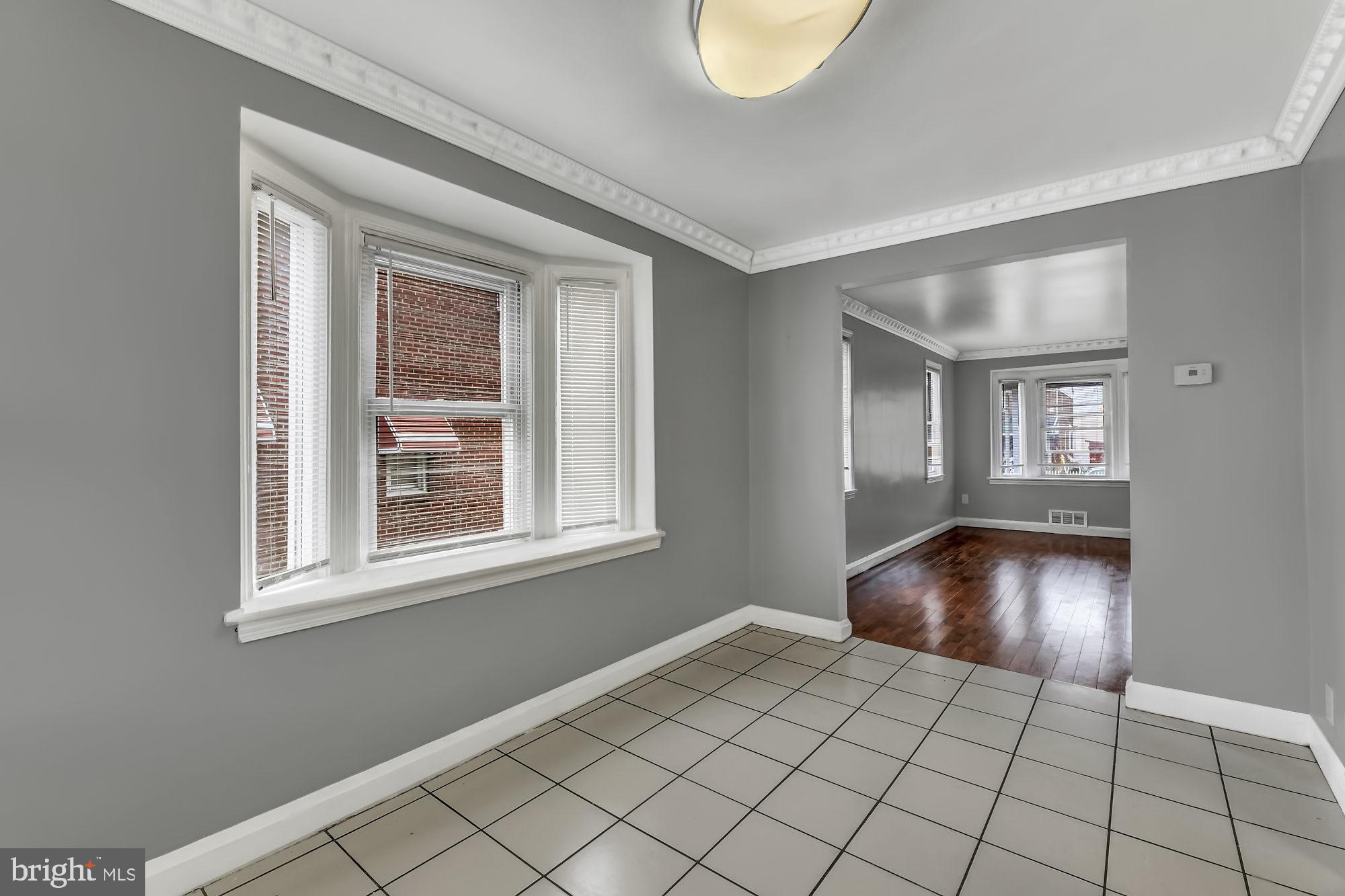 7921 Kavanagh Road Baltimore, MD 21222 - Photo 6 of 28 Dining room with fresh paint and new light fixture
