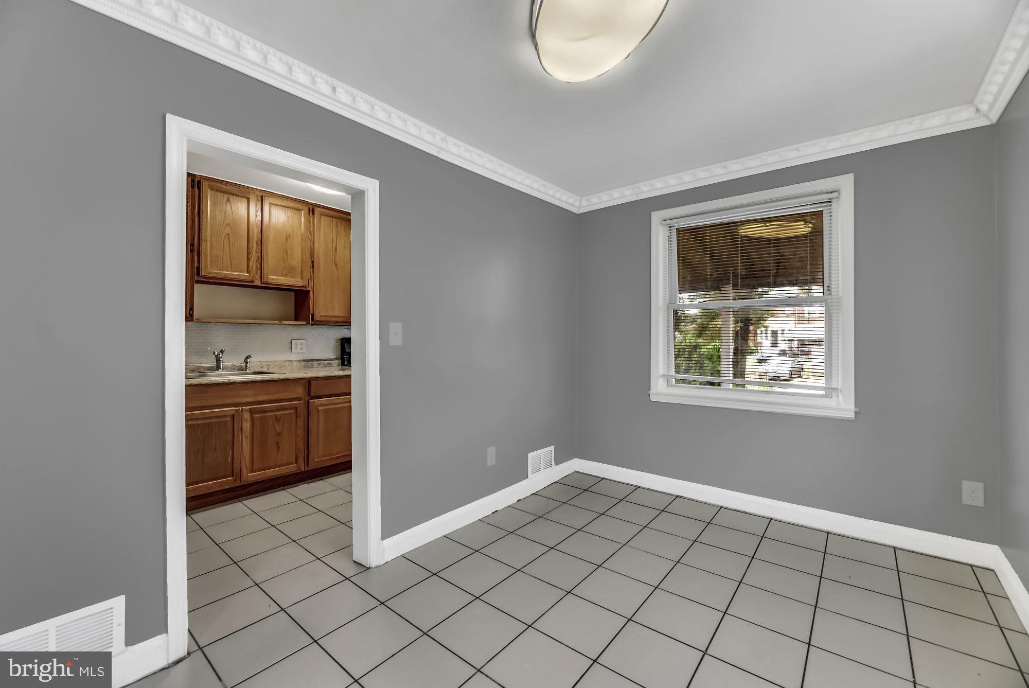7921 Kavanagh Road Baltimore, MD 21222 - Photo 8 of 28 Dining room looking into kitchen