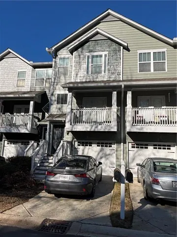 a front view of a building with retail shop
