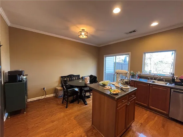 a kitchen with granite countertop lots of counter top space