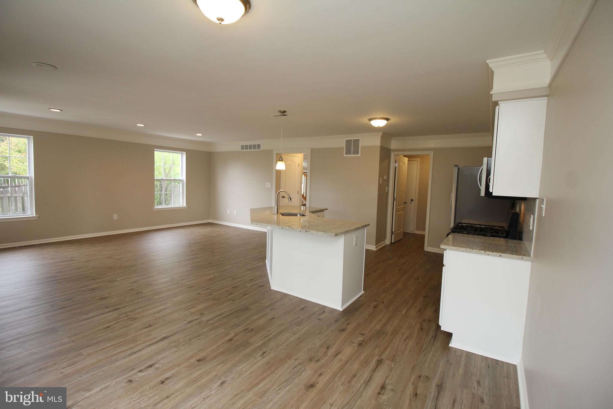 121 Wilson Lane Berlin, NJ 08009 - Photo 16 of 59 a view of kitchen with windows and refrigerator