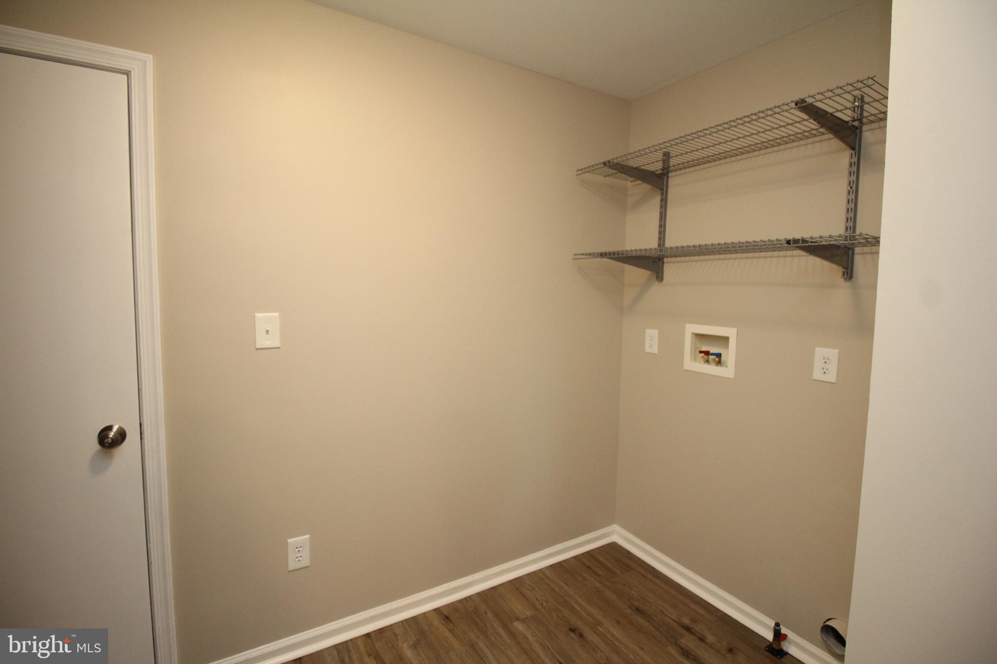 121 Wilson Lane Berlin, NJ 08009 - Photo 23 of 59 a view of small space with racks on the wall