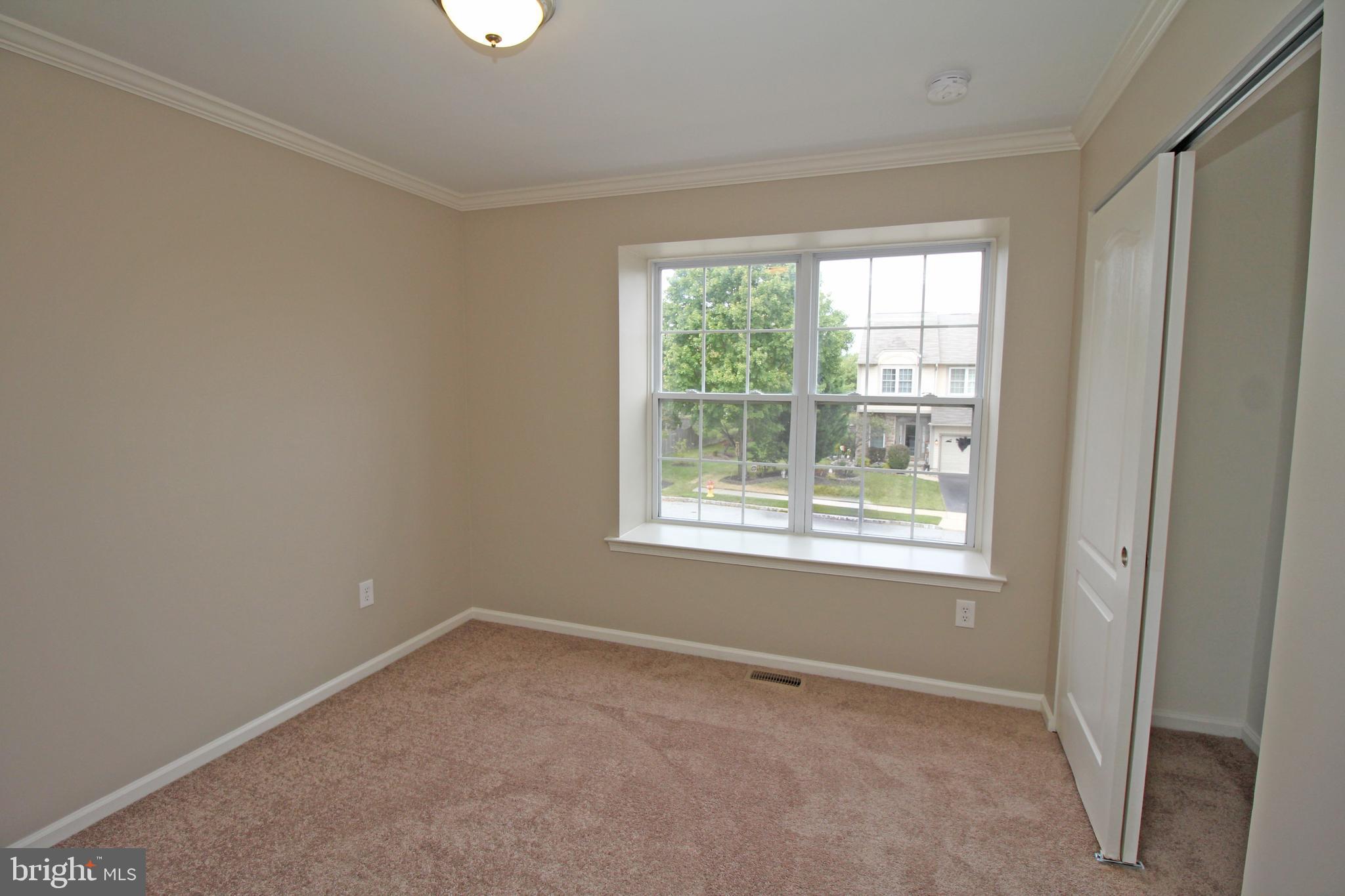 121 Wilson Lane Berlin, NJ 08009 - Photo 32 of 59 an empty room with a window