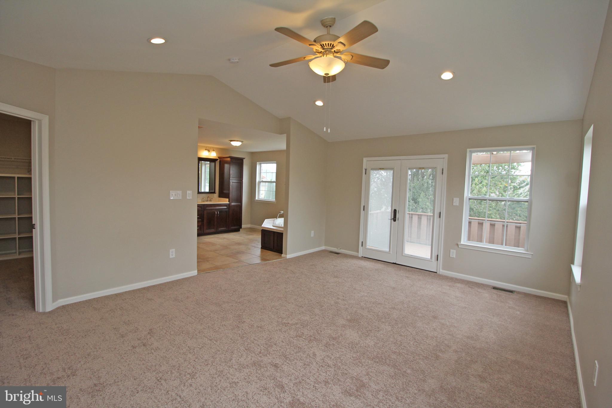 121 Wilson Lane Berlin, NJ 08009 - Photo 37 of 59 a view of an empty room with a window