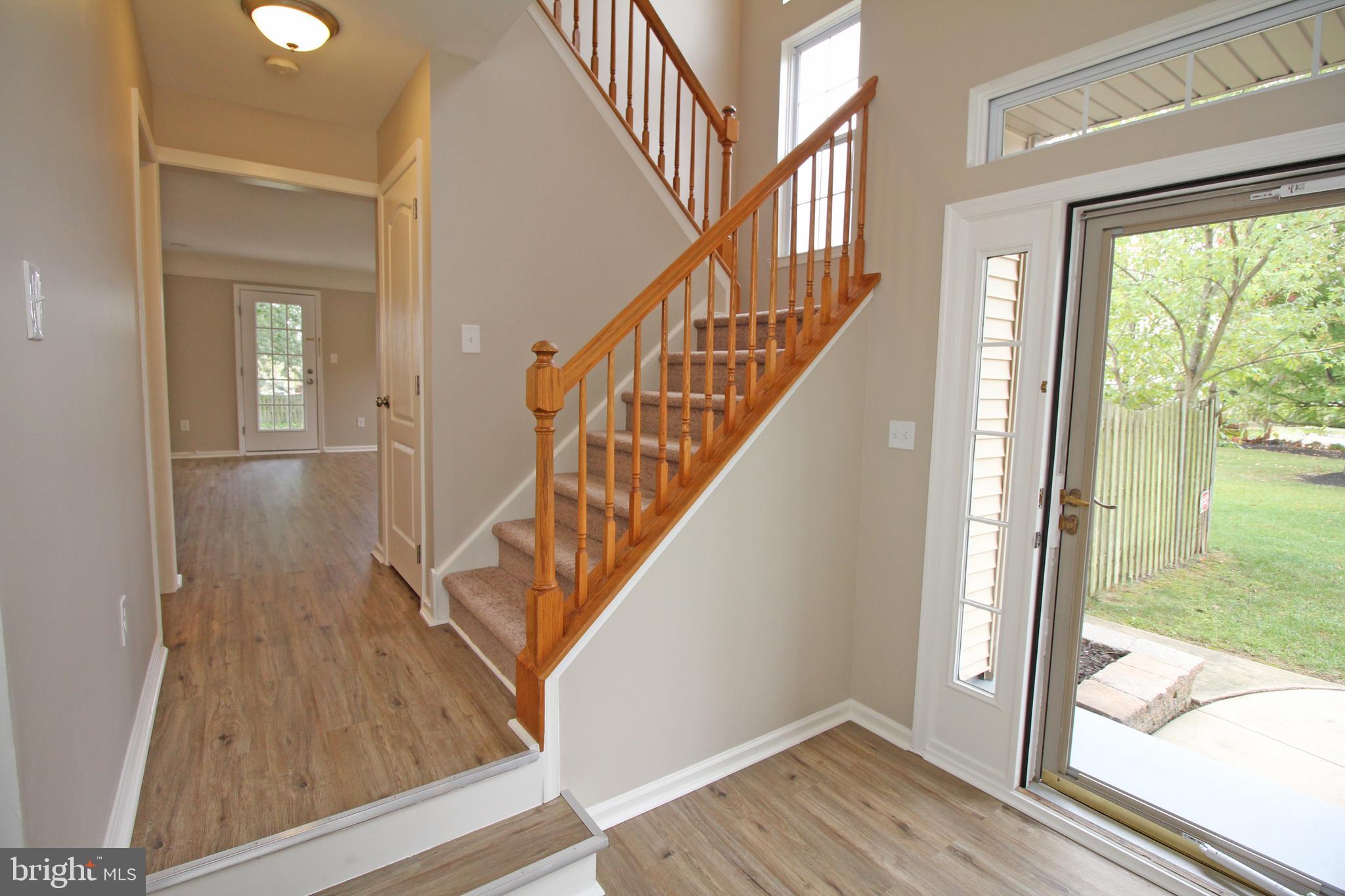 121 Wilson Lane Berlin, NJ 08009 - Photo 4 of 59 a view of entryway with wooden floor and door