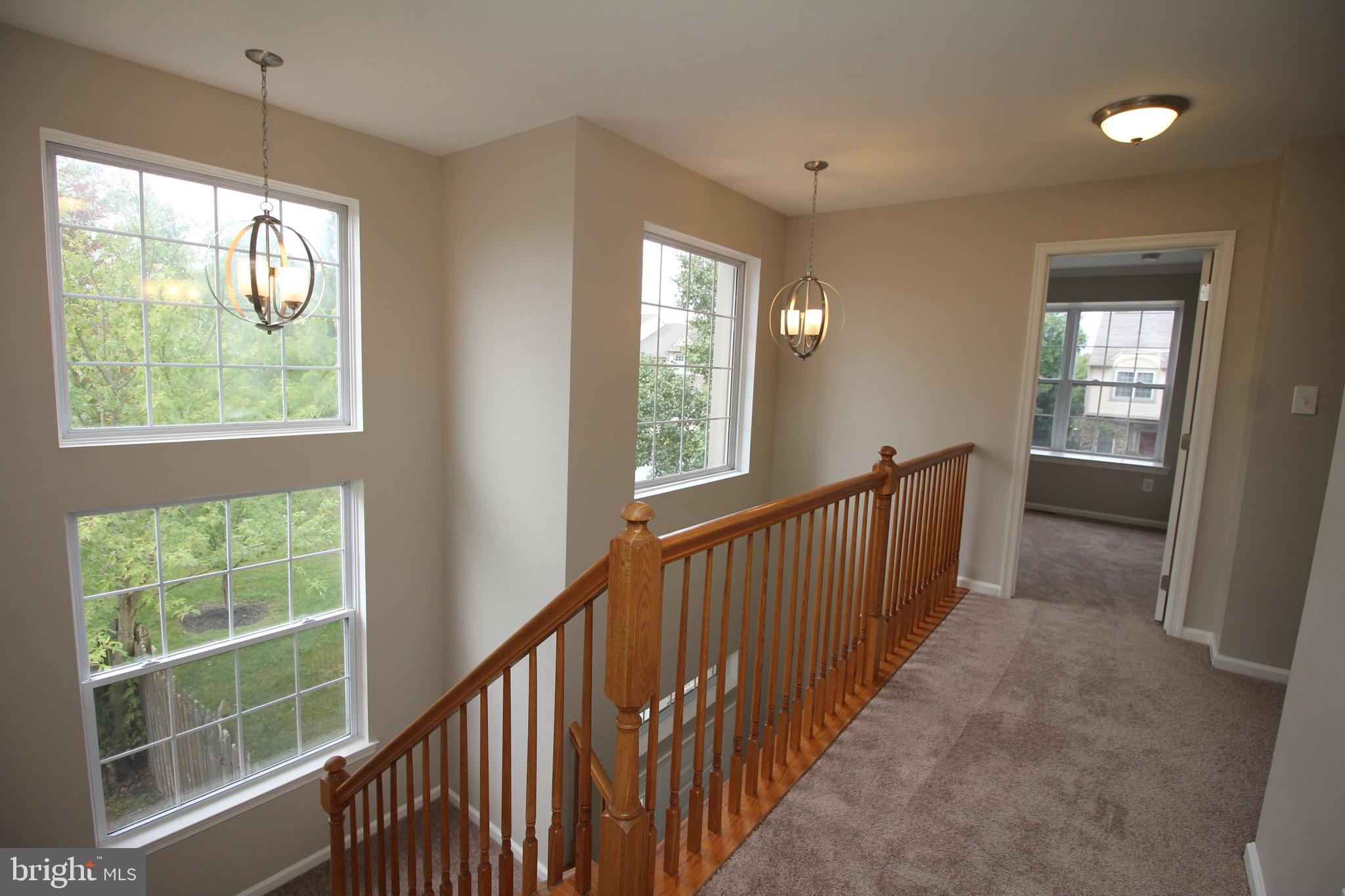 121 Wilson Lane Berlin, NJ 08009 - Photo 48 of 59 a view of hallway with windows