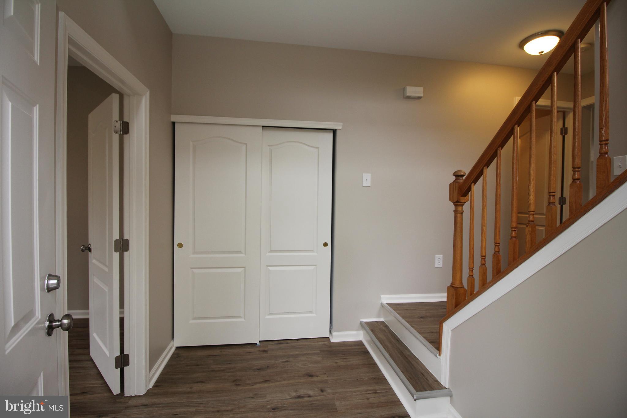 121 Wilson Lane Berlin, NJ 08009 - Photo 5 of 59 a view of entryway with wooden floor and stairs