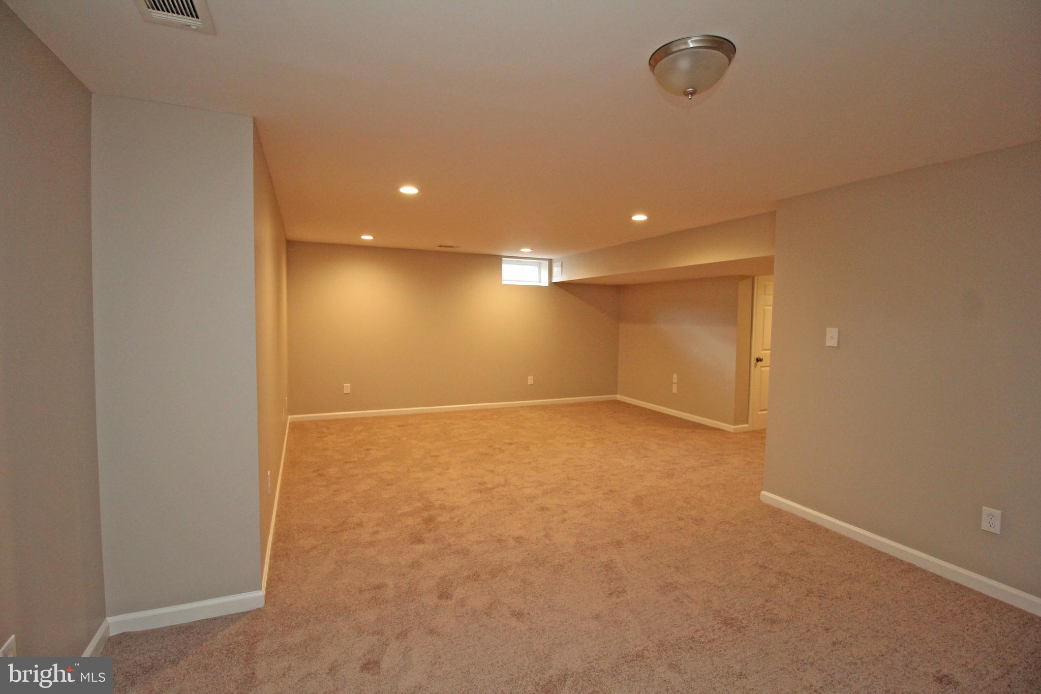 121 Wilson Lane Berlin, NJ 08009 - Photo 53 of 59 an empty room with a natural light