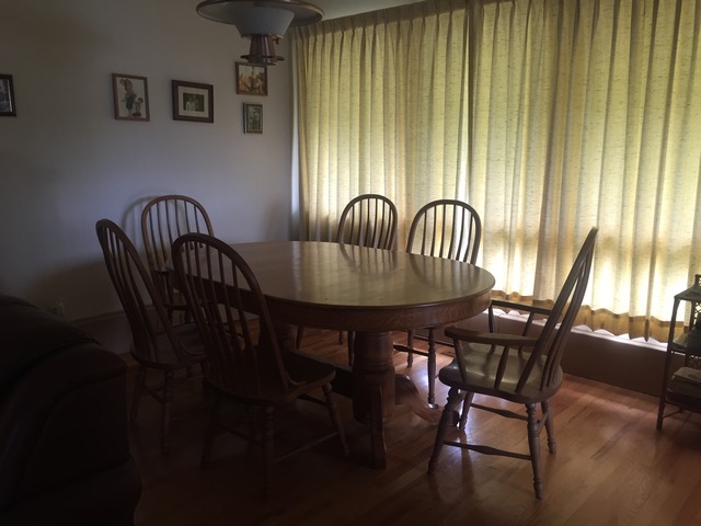 13741 Derby Line Road Genoa, IL 60135 - Photo 5 of 10 a view of a dining room with furniture window and wooden floor