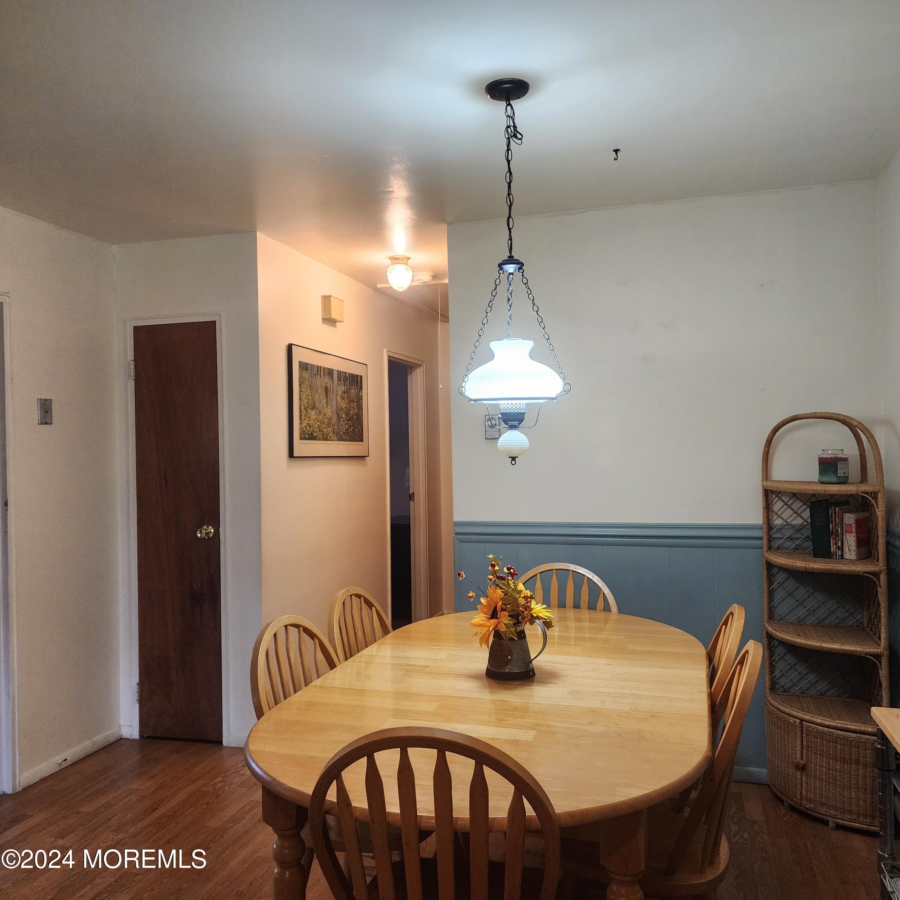 108 Hope Road, Unit D Whiting, NJ 08759 - Photo 18 of 26 a view of a dining room furniture and chandelier