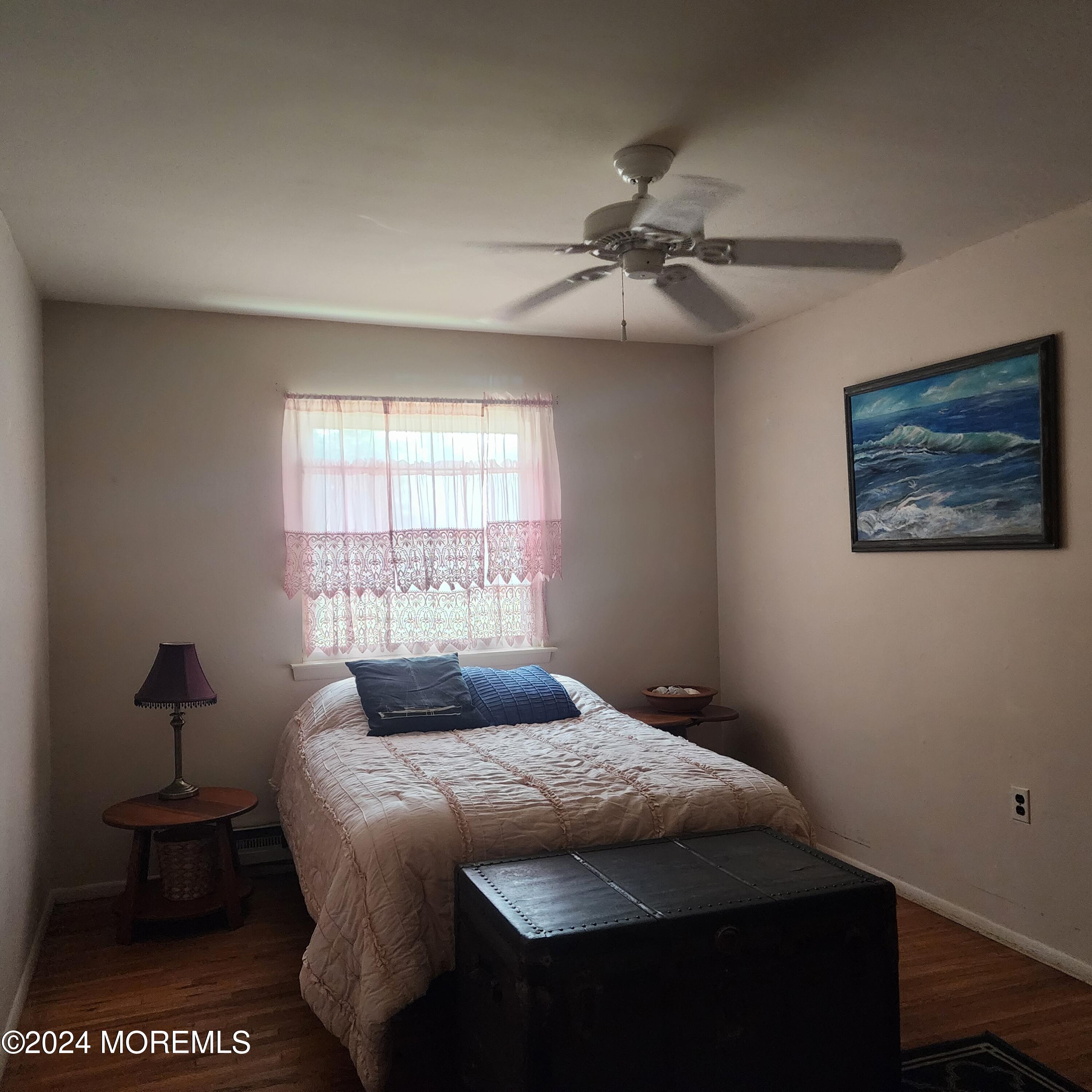 108 Hope Road, Unit D Whiting, NJ 08759 - Photo 20 of 26 a bedroom with a bed and a window