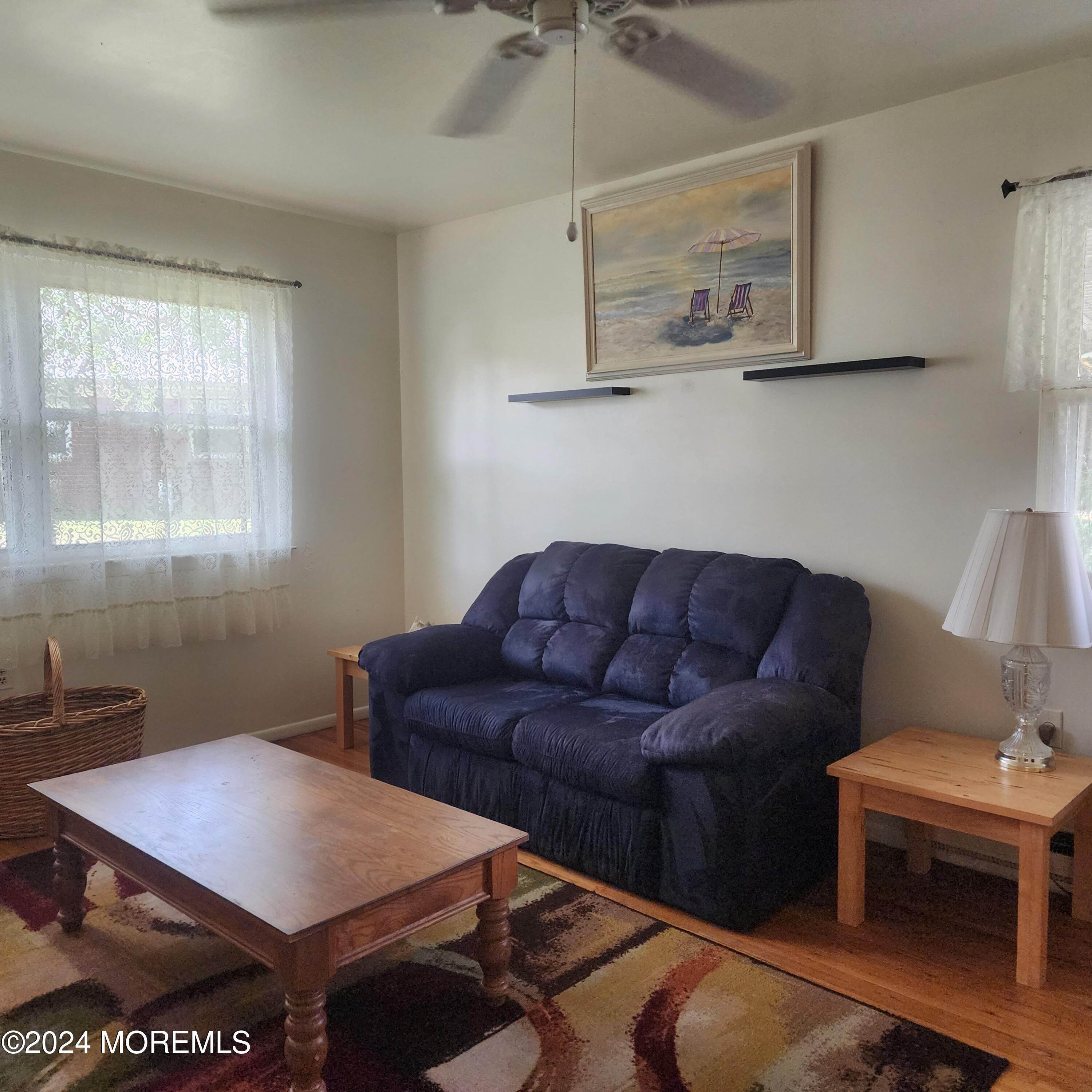 108 Hope Road, Unit D Whiting, NJ 08759 - Photo 9 of 26 a living room with furniture and window