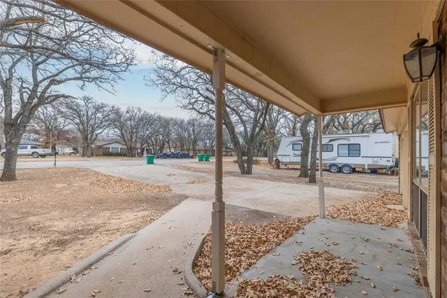 a view of a park with a tree