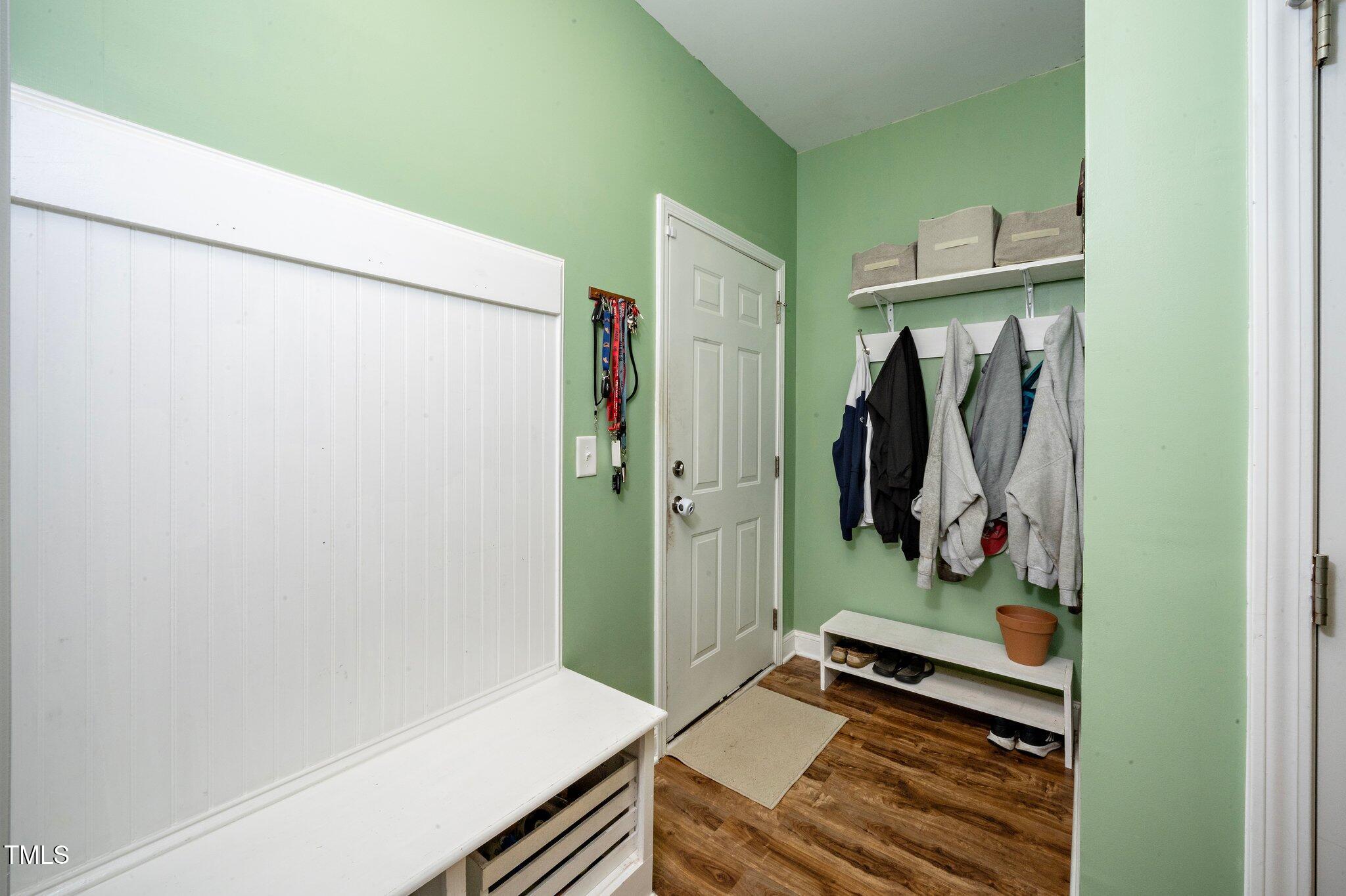 82 Mariners Point Way Garner, NC 27529 - Photo 14 of 30 a view of walk in closet with clothes and shoes