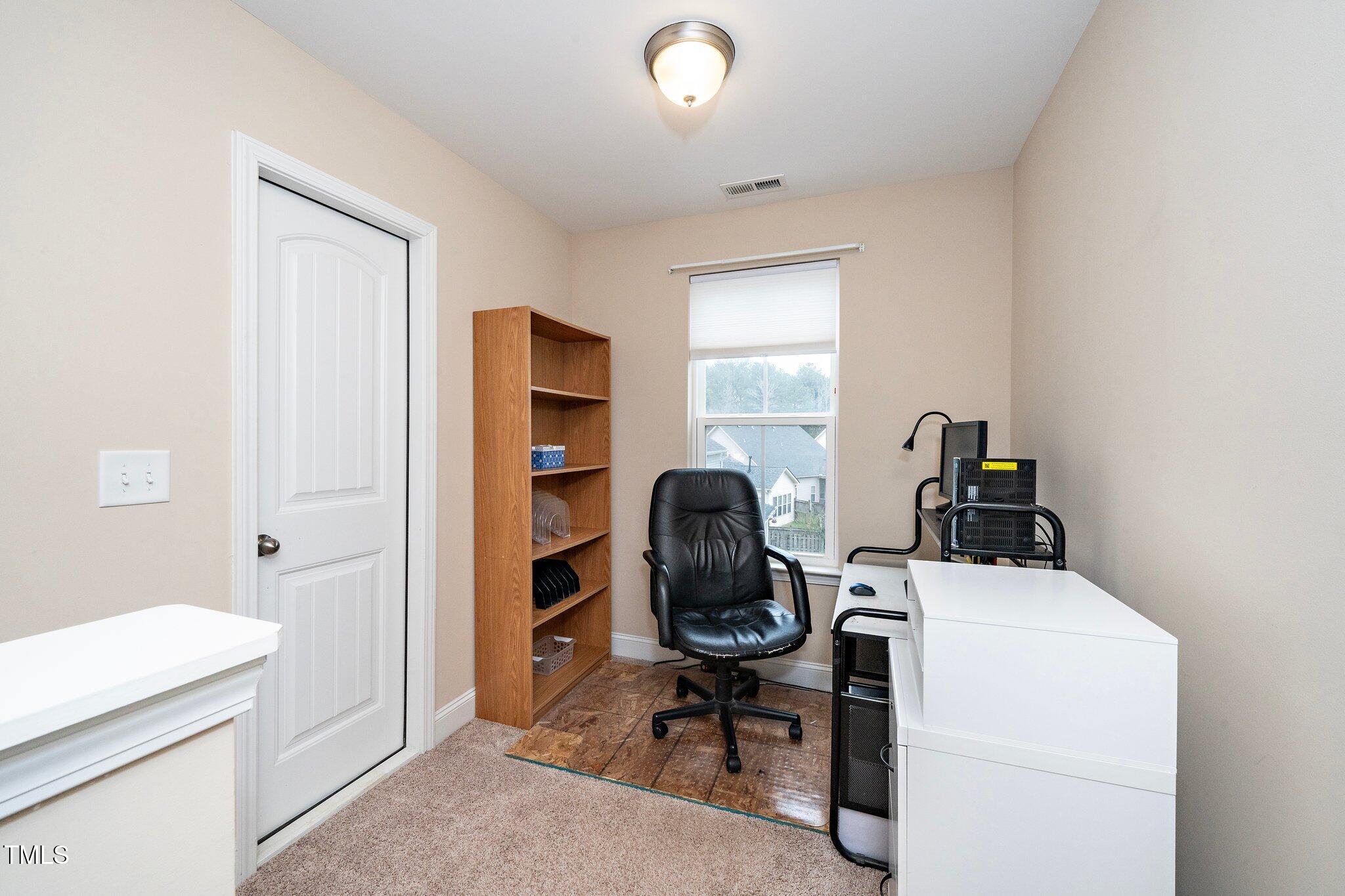 82 Mariners Point Way Garner, NC 27529 - Photo 21 of 30 a view of a workspace with furniture