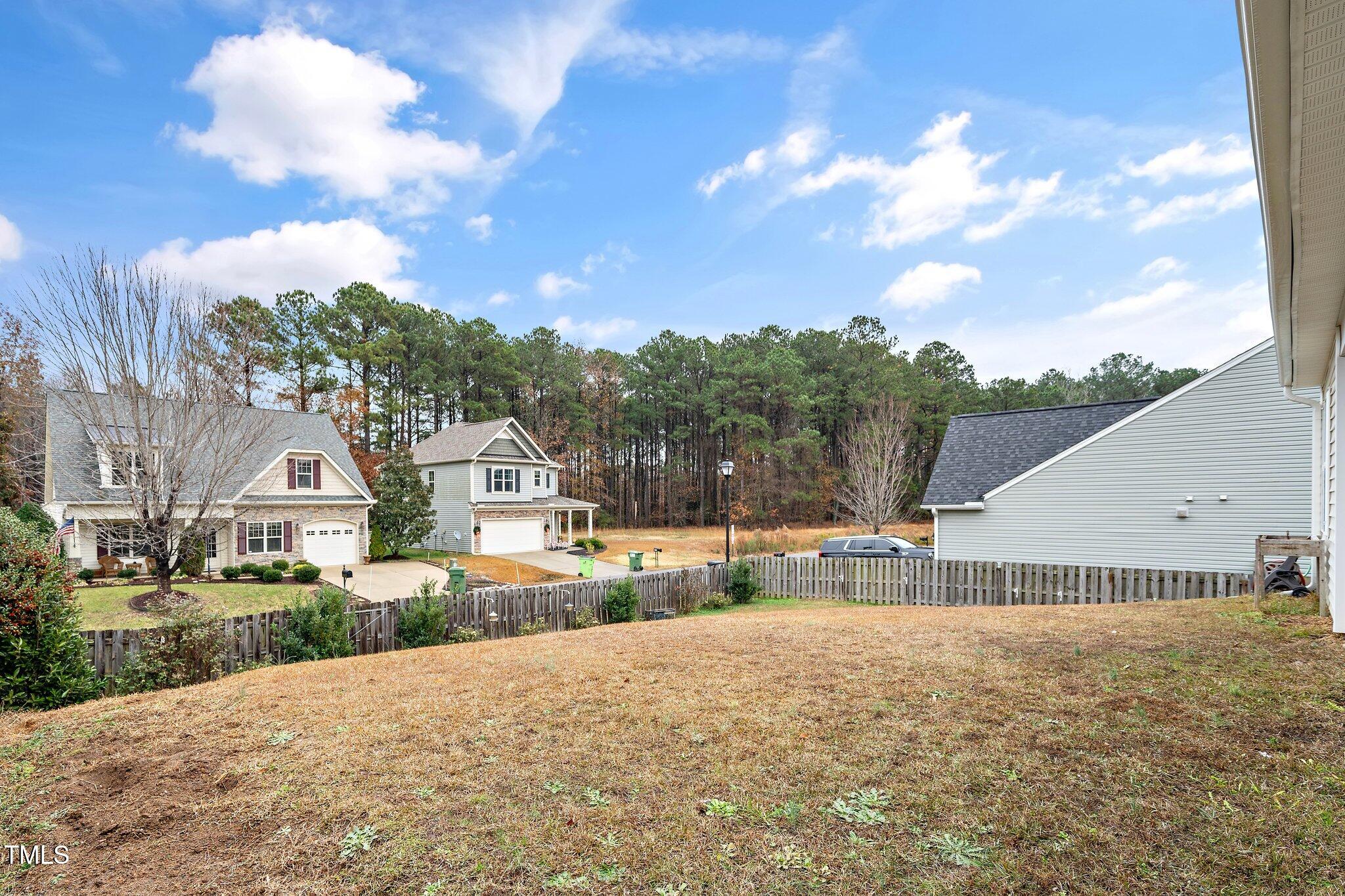 82 Mariners Point Way Garner, NC 27529 - Photo 25 of 30 a view of house with outdoor space and street view