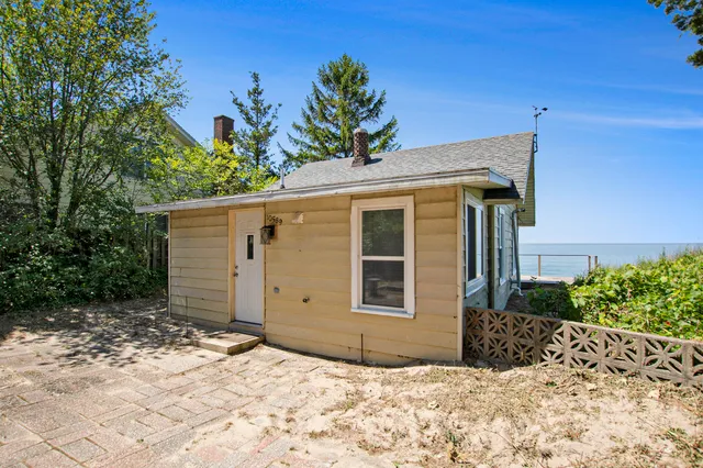 $995,000 | 10589 Lakeshore Drive, West Olive, MI 49460