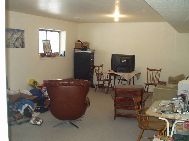 13015 Welcome Reno, NV 89511 - Photo 5 of 8 a living room with furniture a flat screen tv and a window