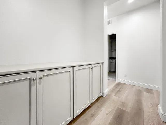 a utility room with sink dryer and washer
