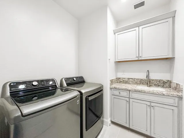 a view of a hallway with windows